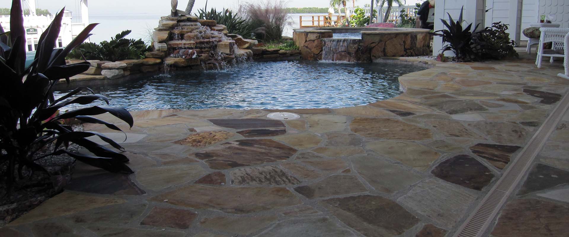 Custom Flagstone Patio and Pool Deck by Waterscapes Pool Remodeling