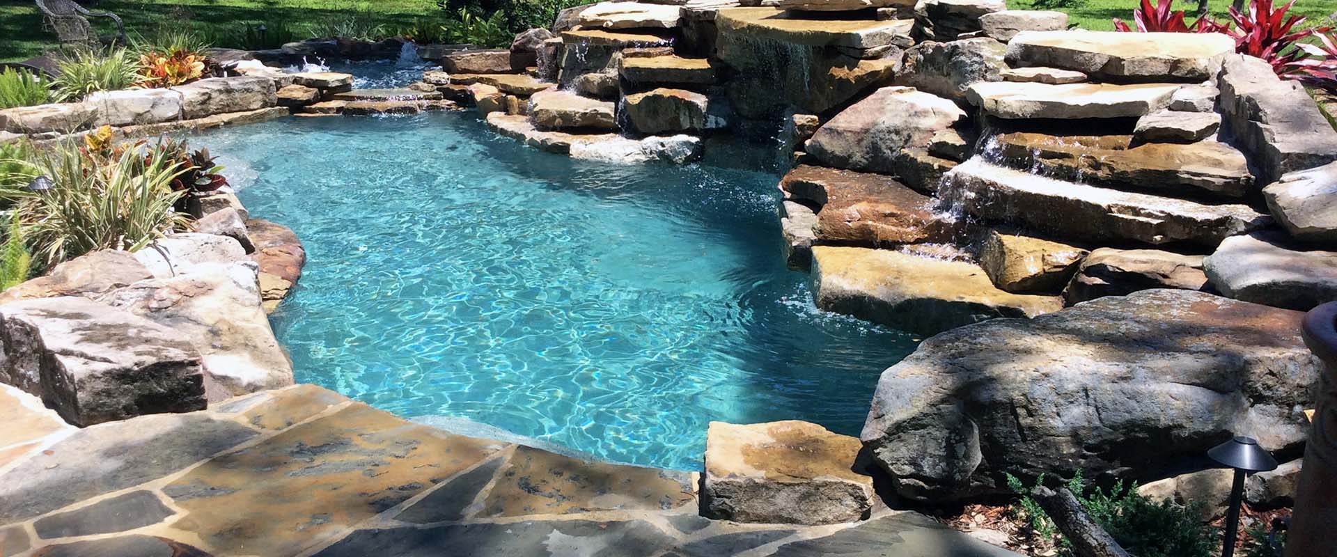 Custom Pool Waterfall by Waterscapes Pool Remodeling Company